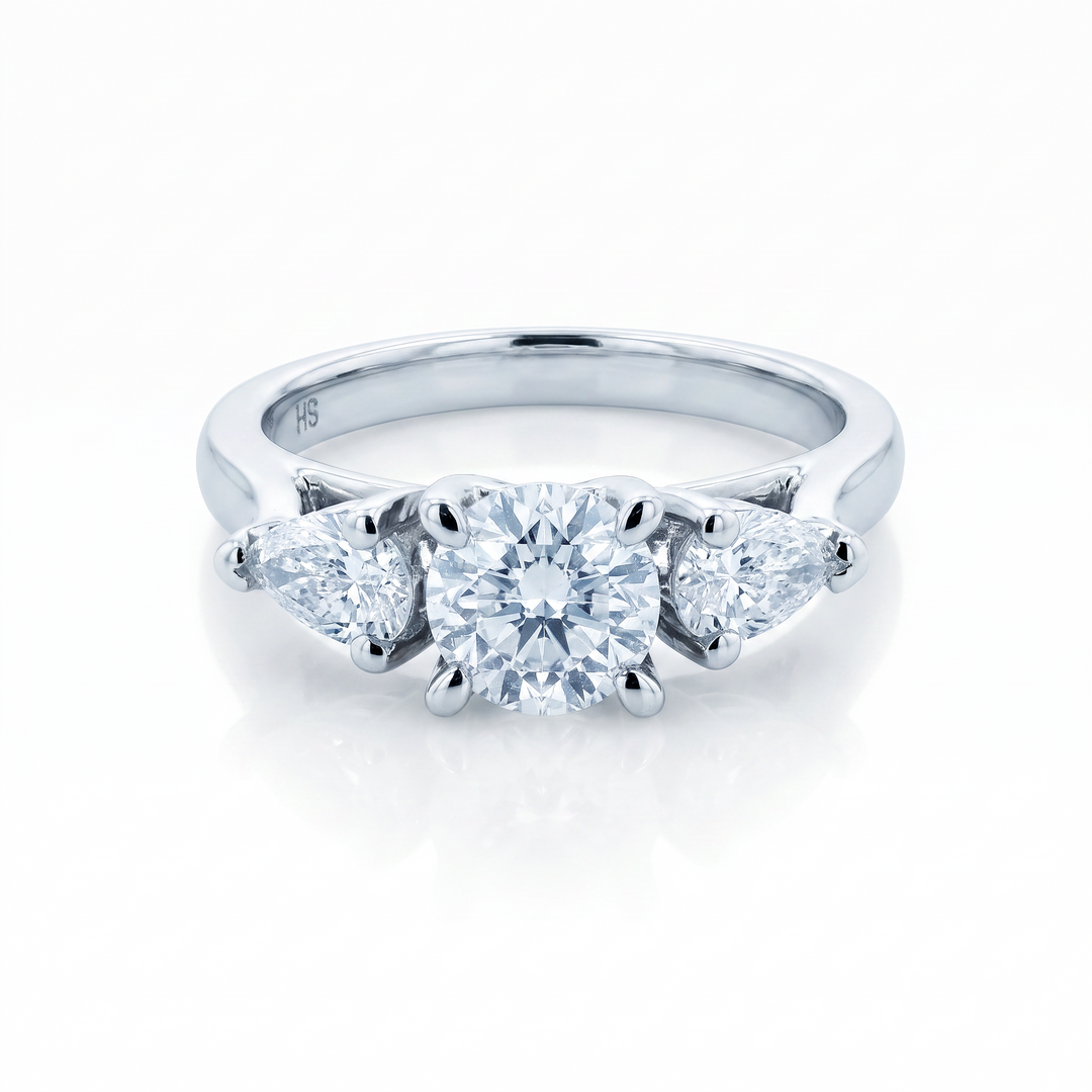 Trilogy Diamond Ring with Pear Shaped Sides — 0.40ct D SI2 (Clearance)